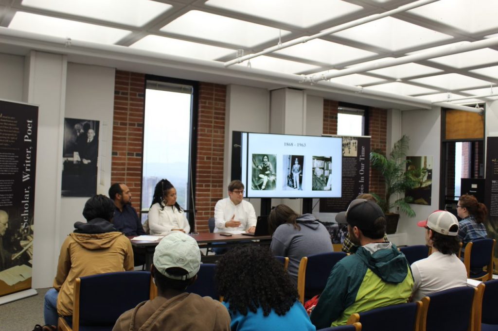 Dr. Whitney Battle-Baptiste, Adam Holmes, and Aaron Yates participate in a panel discussion in October, 2022 on the life and legacy of W. E. B. Du Bois