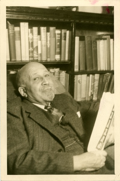 W. E. B. Du Bois seated in his study, c. 1950
